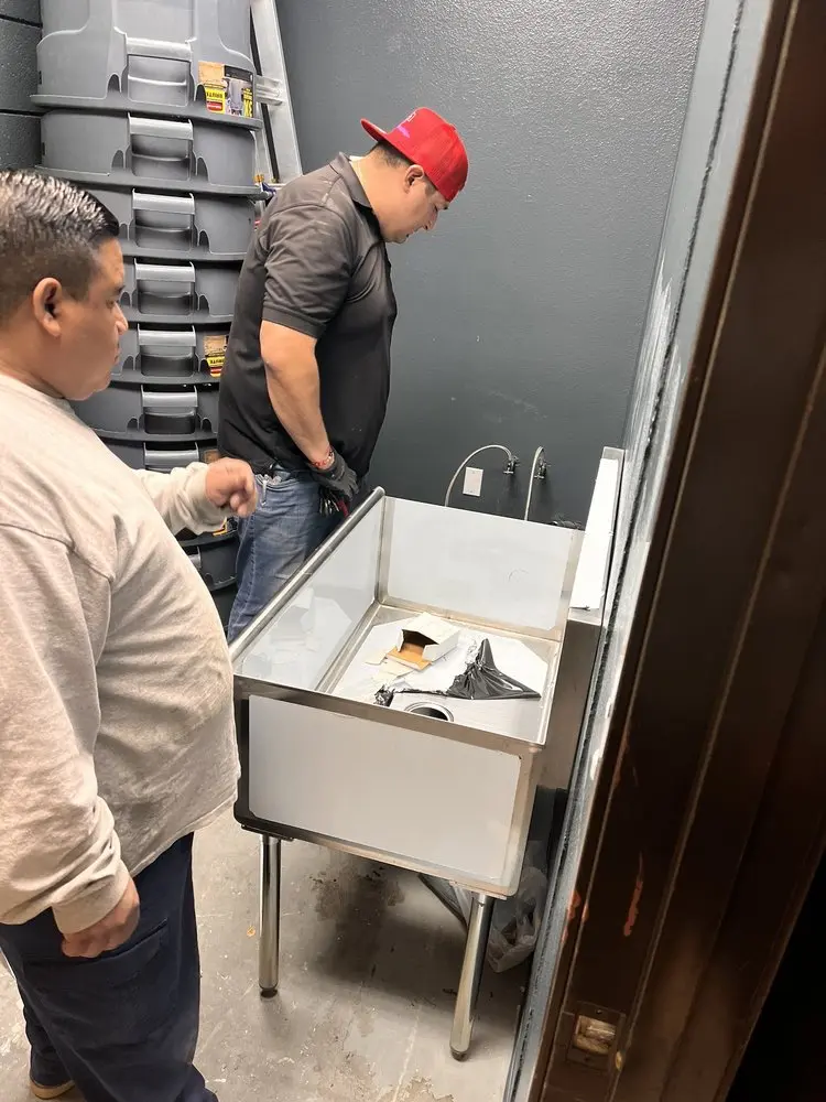 Commercial plumbing and sink installation in Watson